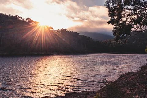 Sunset over the lake Stock Photos