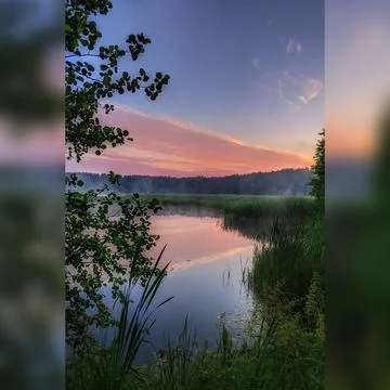 Sunset over the lake Stock Photos