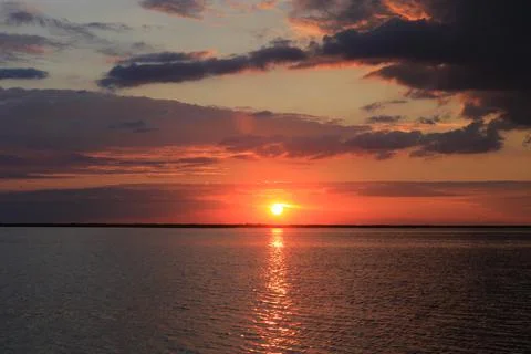 Sunset over lake Stock Photos