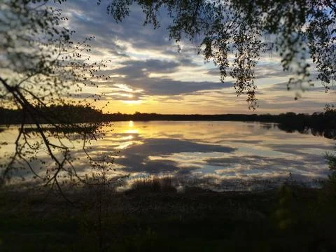 Sunset over the lake 写真素材