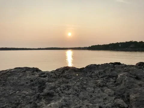 Sunset over the lake 写真素材