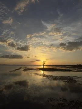 Sunset over the lake Stock Photos