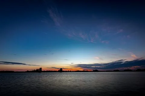 Sunset over lake Stock Photos