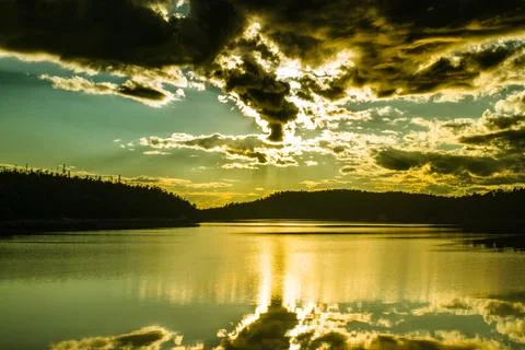 Sunset over the lake Stock Photos