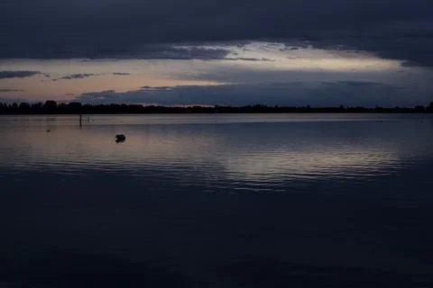Sunset over a lake Stock Photos