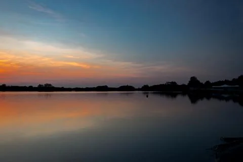 Sunset over lake Stock Photos