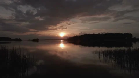Sunset over the lake, pond at sunset Stock Footage 196136250
