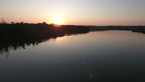 Sunset over the lake. Reflection in the water. Stock Footage 161509481
