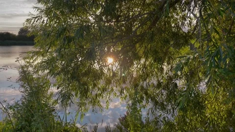 Sunset over lake sky reflections movement Stock Footage 250405785