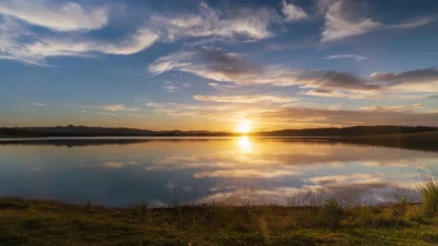 Sunset over a lake Timelapse Stock Footage 155559578