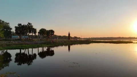 Sunset Over Lake Toho Lighthouse At Kissimmee Lakefront Park... Stock Footage 332506269