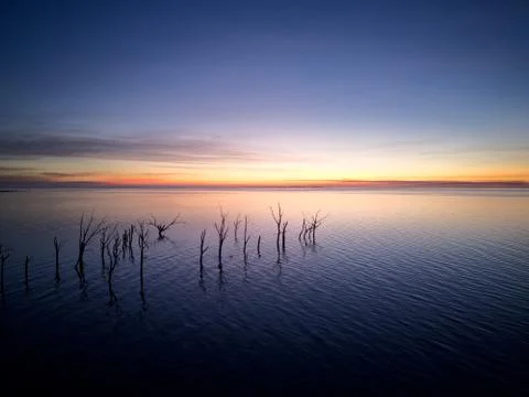 Sunset Over Lake Tranquil Trees Stock Photos