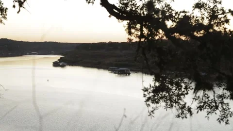 Sunset Over Lake Travis at Dusk with Docks and Boats - Austin, Texas Stock Footage 328536749