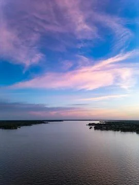 Sunset over a lake using a drone Stock Photos
