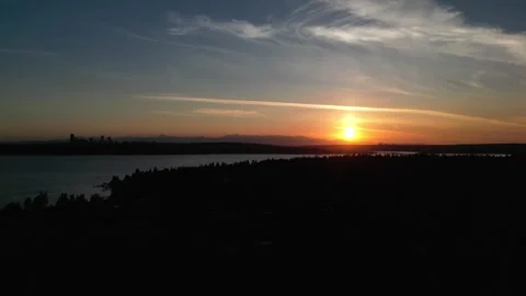 Sunset over lake washington looking at seattle Stock Footage 294708626