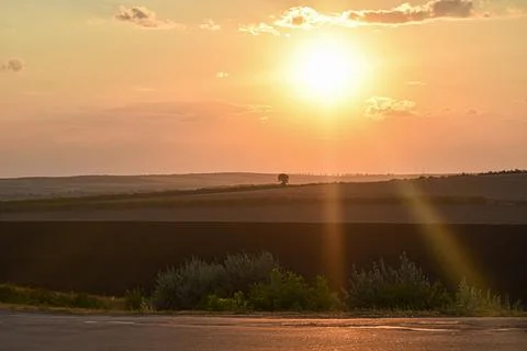 The sunset over the land Stock Photos