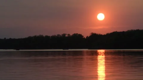 Sunset over a large lake Stock Footage 67523461