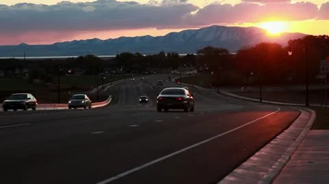 Sunset Over Layton Parkway with Light Traffic Stock Footage 12351171