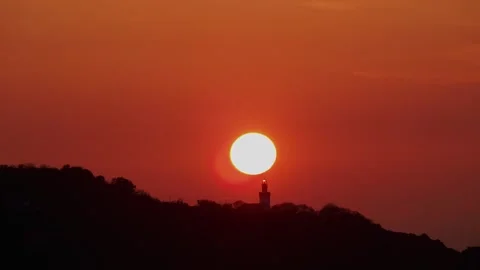 Sunset over the lighthouse and the coast. Stock Footage 263375795