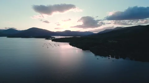 Sunset over Loch Lomond from a drone, Trossachs National Park, Southern Scotland 動画素材 198762083