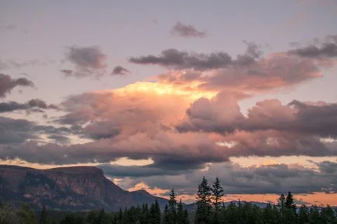 Sunset over a lone mountain Stock Photos