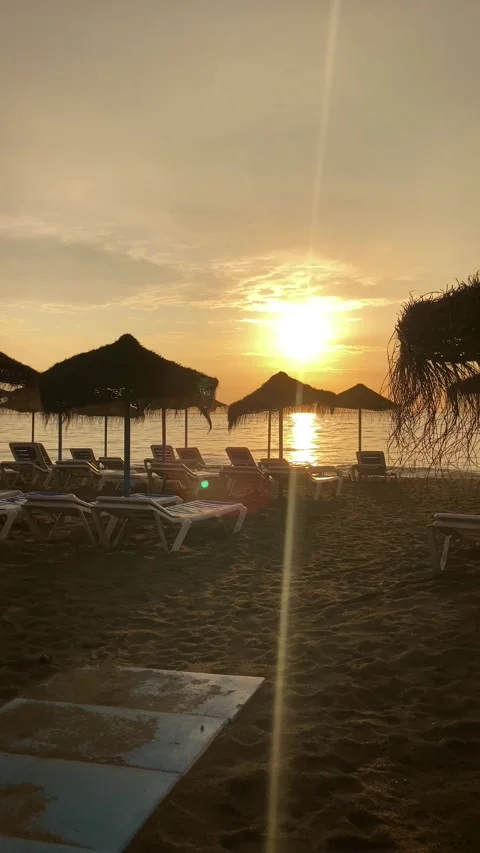 Sunset over Los Alamos beach, Mediterranean sea in Torremolinos, Malaga, Spain Stock Footage 288147753