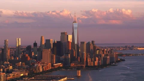 Sunset over Lower Manhattan Skyline, One World Trade Center prominent Stock Footage 301080843