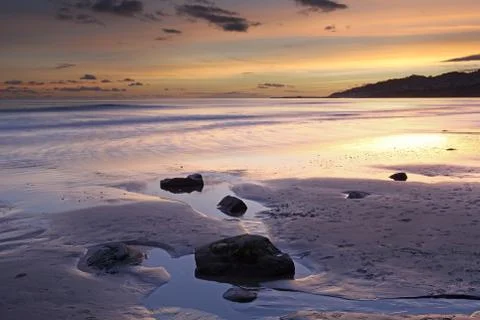 Sunset over lyme regis Stock Photos