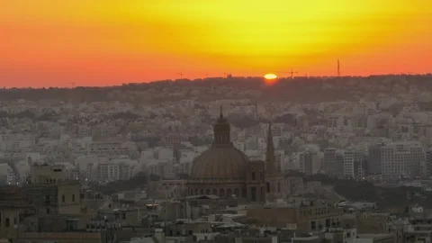 Sunset over main cathedral in Valletta city, Malta island. Drone view Stock Footage 279386352