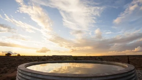 Sunset over man-made farm dam Stock Footage 73108455