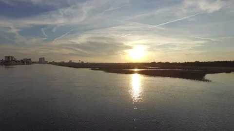 Sunset Over Marsh Low Flying Stock Footage