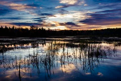 Sunset over marsh Stock Photos