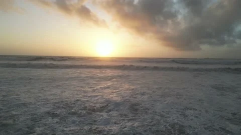 Sunset Over Massive Beautiful Waves Stock Footage 229414671
