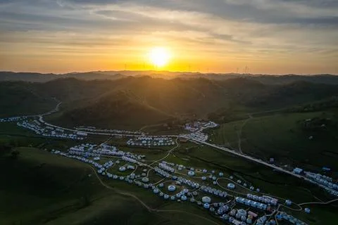 Sunset over the meadow Stock Photos