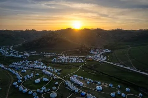 Sunset over the meadow Stock Photos