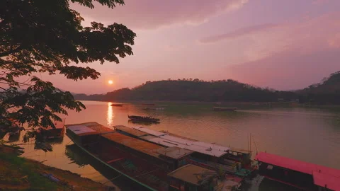 Sunset over the Mekong River in World Heritage Luang Prabang Laos Stock Footage 343764652