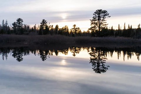 Sunset over mirror calm water Stock-Footage 128153618