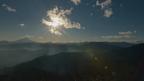 Sunset over misty mountain layers from Mount Ōtake, Japan Timelapse Stock Footage 319622573