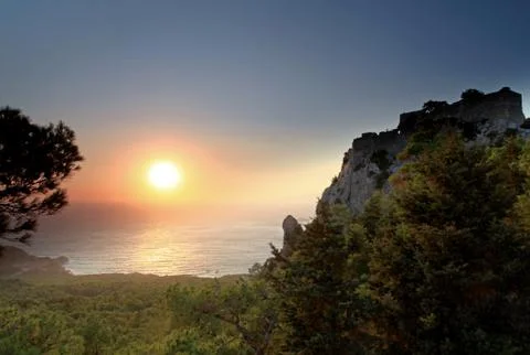 Sunset over monolithos castle Stock Photos