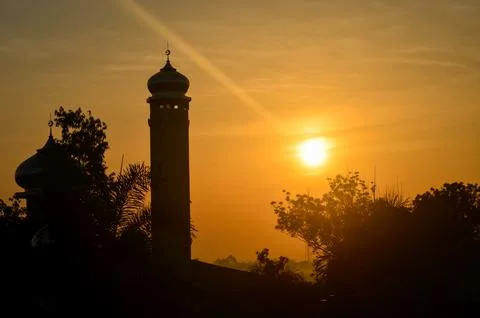 Sunset over the mosque 写真素材