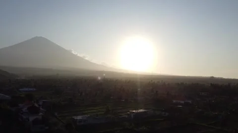 Sunset over Mount Agung volcano in Amed Stock Footage 329244520