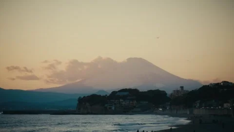 Sunset Over Mount Fuji and Enoshima at Shichirigahama, Japan Stock Footage 345376651