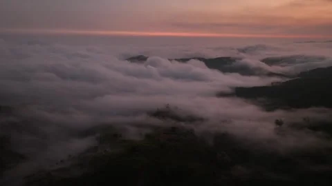 Sunset over mountain with clouds Stock Footage 257656031