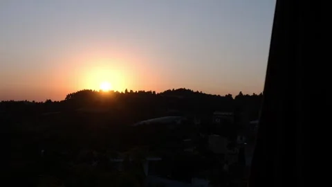 Sunset over the mountain creates stunning panorama blending colors of sky with Stock Footage 280305572