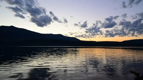 Sunset Over Mountain Lake - 4K Time Lapse 스톡 동영상 221460333