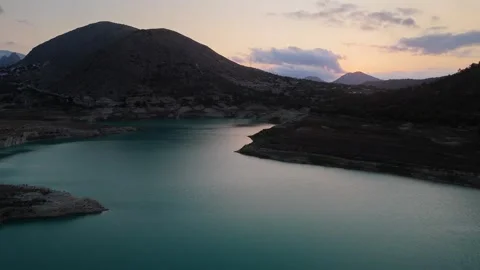 Sunset Over Mountain Lake Drone View Stock Footage 314606644