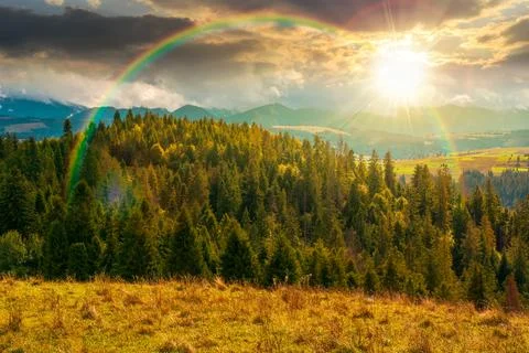 Sunset over mountain landscape in september Fotos Stock