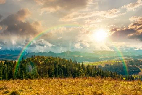 Sunset over mountain landscape in september Fotos Stock