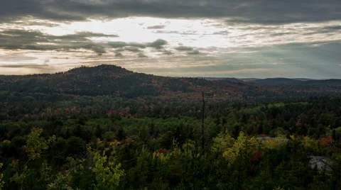 Sunset over mountain peak and autumn colors Stock Footage 43912320