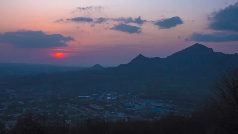 Sunset over a mountain peak Stock Footage 151424474
